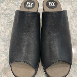 Brand new Fly London slide-ons. Never worn